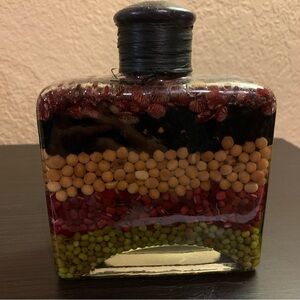Decorative vinegar infused glass spice bottle